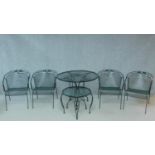 A set of four painted green contemporary metal garden chairs together with matching table and coffee