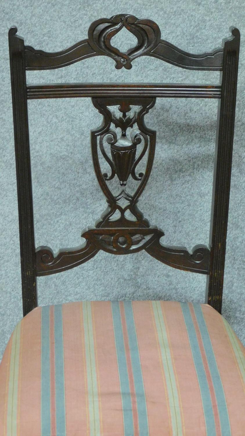 A set of three Edwardian style nursing chairs with carved back and shot silk candy stripe - Image 3 of 5