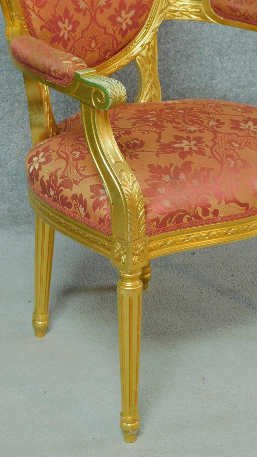 A gilt framed fauteuil in the Louis XVl style in floral rouge upholstery. H.104cm - Image 4 of 7