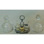 A collection of cut glass items. Including two antique diamond cut crystal perfume bottles with