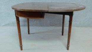 A 19th century style mahogany D end console table opening to a tea table on turned tapering