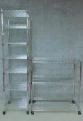 Two sets of contemporary aluminium kitchen shelving on casters. H.97 W.91 D.47cm