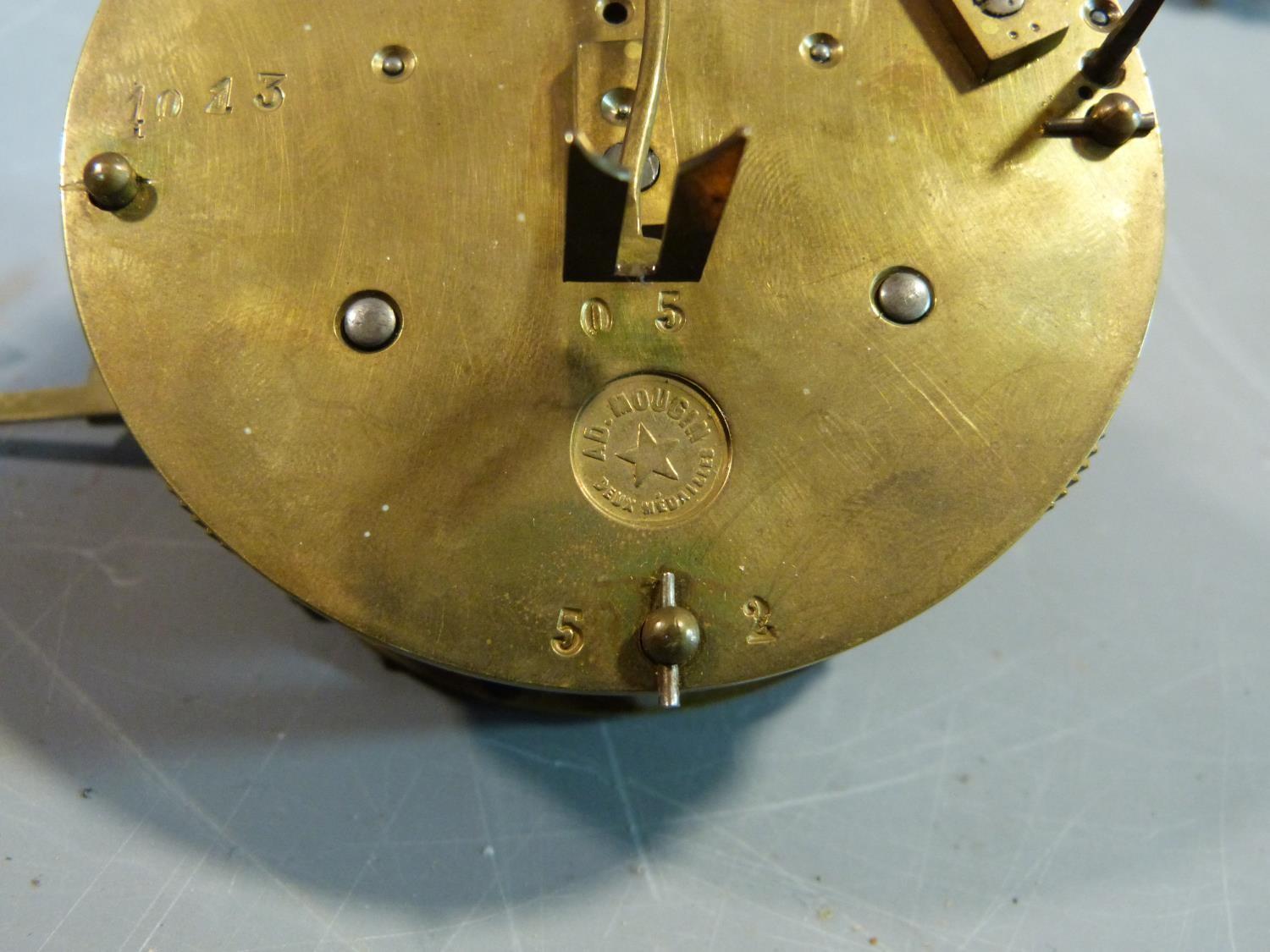 A collection of antique brass clock and watch mechnisms including strikers,bells, barrells and other - Image 11 of 14