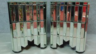 A pair of contemporary Art Deco style mirrored bedside chests of two drawers. H.60 W.45 D.43cm