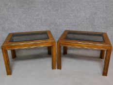 A pair of American walnut Colonial style coffee tables.