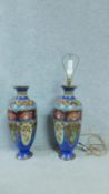 A pair of Meji Period Japanese cloisonné enamel vases, one converted into a lamp base. With dragon