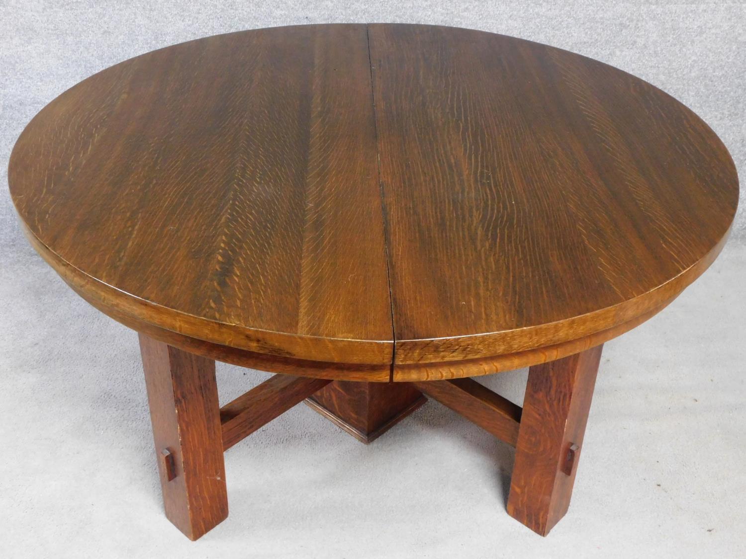 An American Arts and Crafts Mission style oak extending table with four extra leaves. H.72 W.249 D. - Image 3 of 7