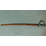 An antique cavalry sword with leather scabbard and pierced and engraved pattern scroll hilt. W.100cm