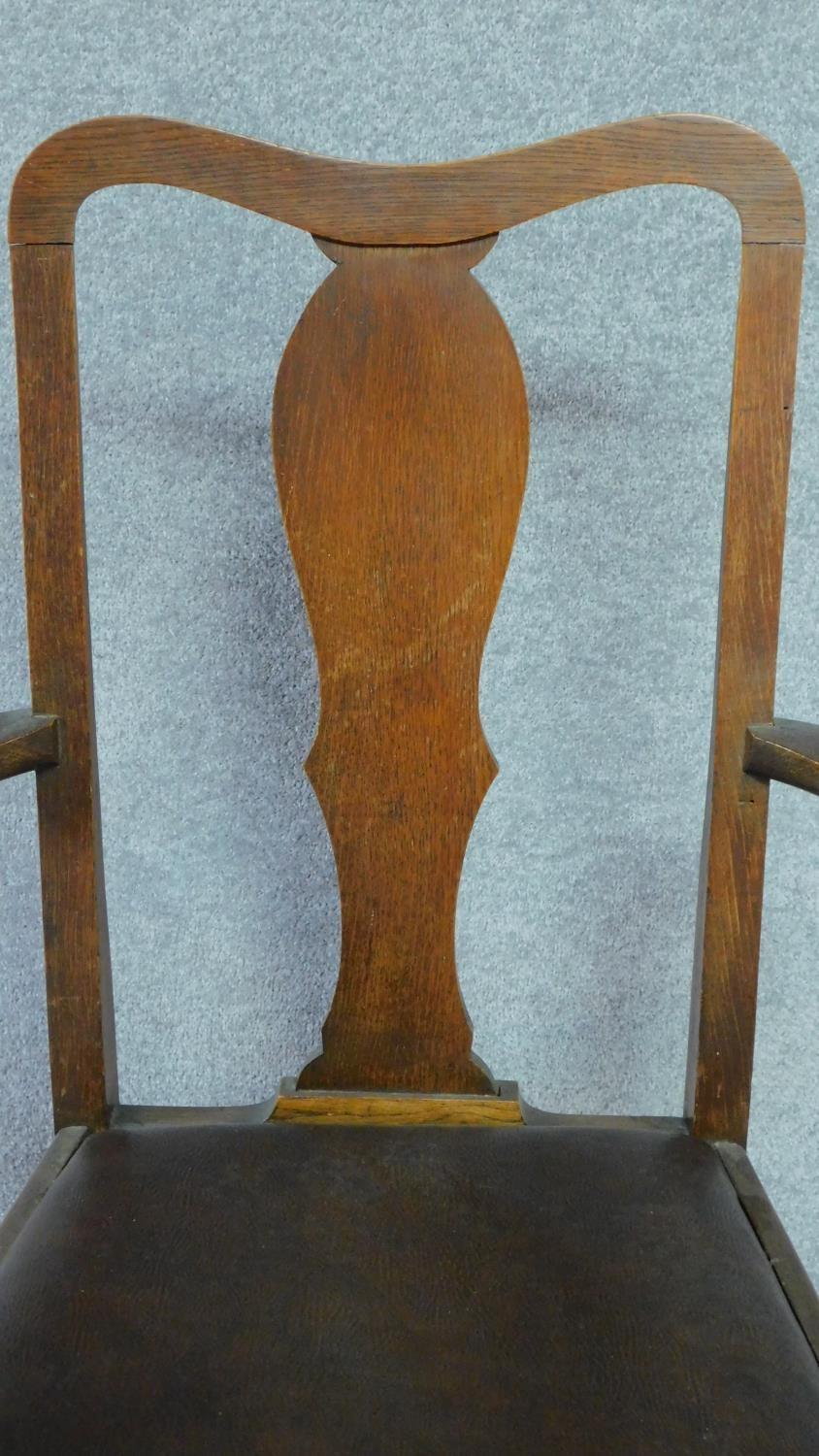 A pair of Edwardian oak armchairs with leather drop in seats on cabriole supports. H.103cm - Image 3 of 6