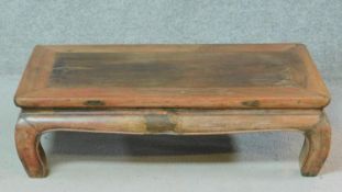 A Chinese hardwood low coffee table. H.23 W.80 D.44cm