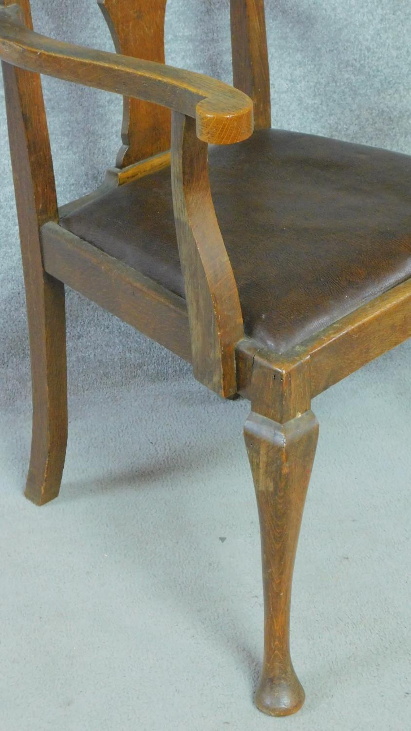 A pair of Edwardian oak armchairs with leather drop in seats on cabriole supports. H.103cm - Image 5 of 6