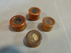 Four antique treen boxwood glass window screw pots. Some with hand written labels to base. largest