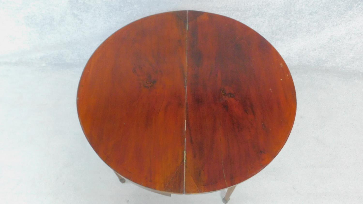 An Georgian mahogany and satinwood inlaid demi lune foldover top tea table on square tapering - Image 2 of 5