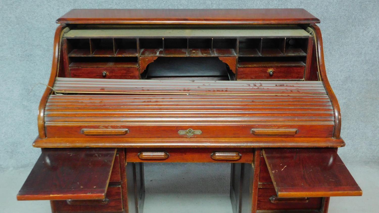 A late 19th century oak roll top desk with tambour shutter and fitted interior on twin pedestal base - Image 4 of 7