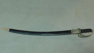 An officers sword with loop guard and leather effect scabbard. W.92cm