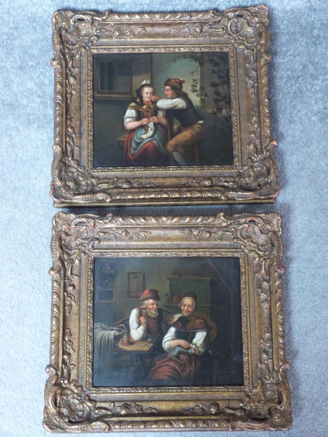 A pair of 19th century carved gilt wood framed Continental School oils on panel of a young couple in