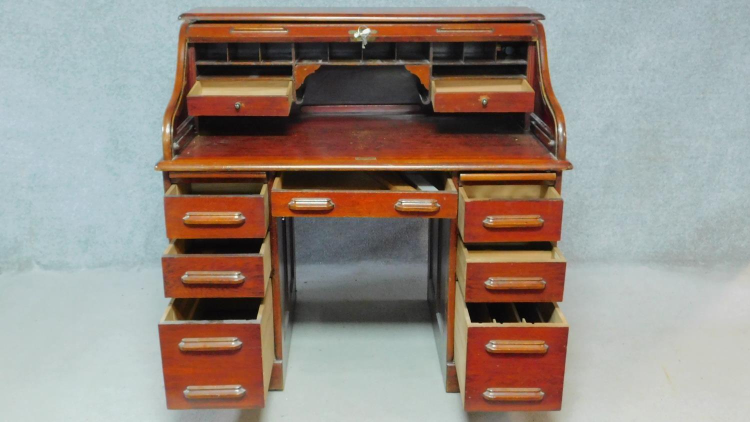 A late 19th century oak roll top desk with tambour shutter and fitted interior on twin pedestal base - Image 3 of 7