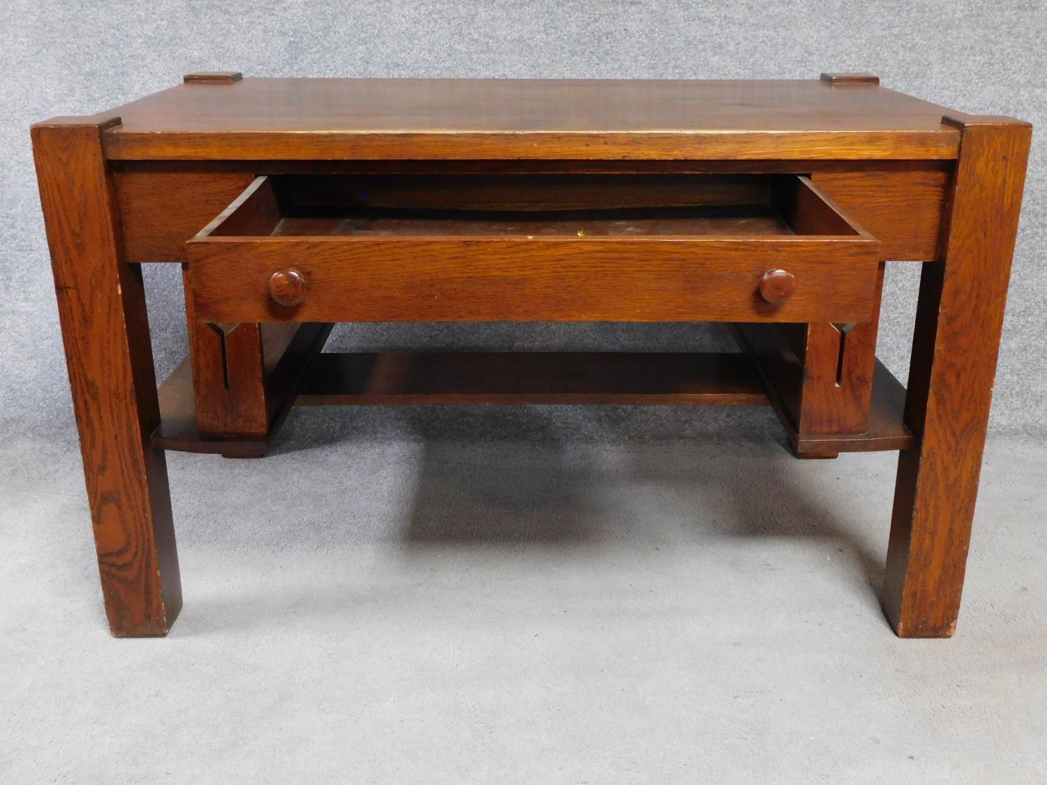 An American Arts and Crafts Mission style oak desk. Fitted with central frieze draw with book - Image 3 of 6