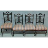 A set of three Edwardian style nursing chairs with carved back and shot silk candy stripe
