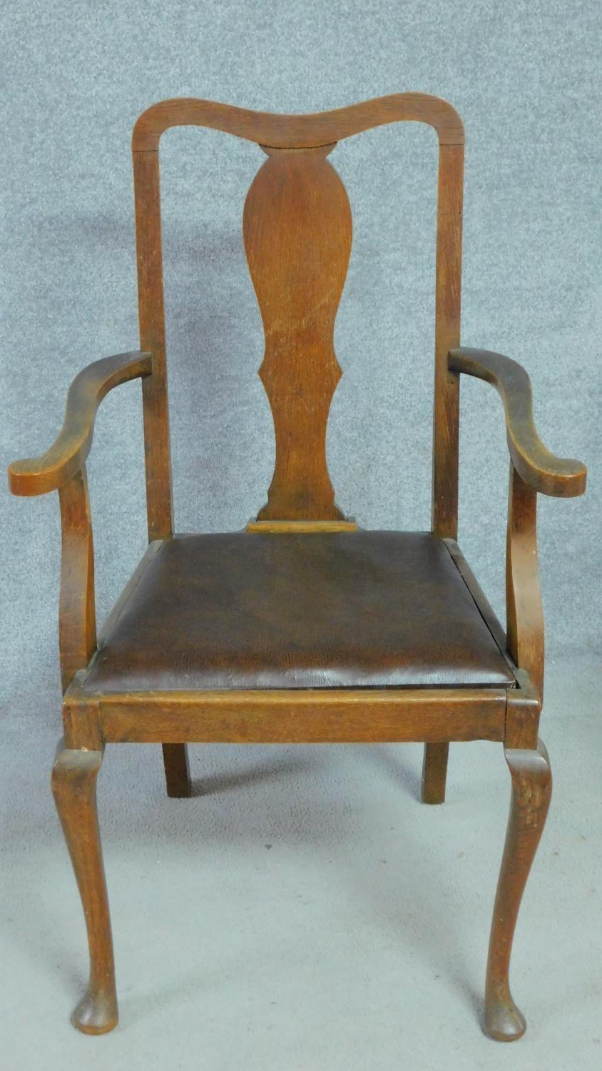 A pair of Edwardian oak armchairs with leather drop in seats on cabriole supports. H.103cm - Image 2 of 6