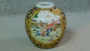 A 20th century Qianlong style hand painted and gilded vase. Decorated with a hunting scene. Qianlong