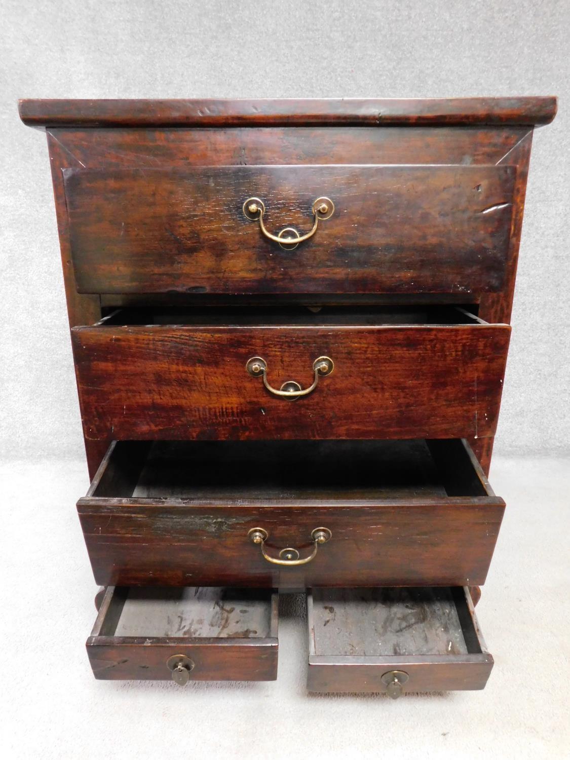 An Eastern hardwood chest with an arrangement of five drawers on cabriole supports. H.113 W.87 D. - Image 3 of 5