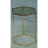A small contemporary brass framed hexagonal glass topped occasional table. H.45 L.35 W.32cm