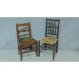 An antique country oak spindle back dining chair with woven rush seat and a country oak dining