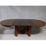An American Arts and Crafts Mission style oak extending table with four extra leaves. H.72 W.249 D.