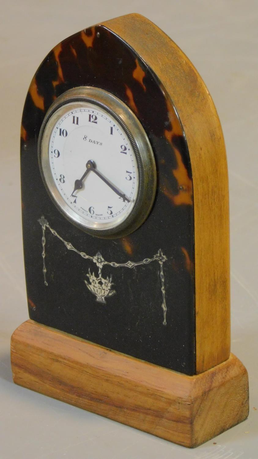 A tortoiseshell cased lancet shaped mantel clock with white metal swag inlay. Swiss made movement. - Image 2 of 7