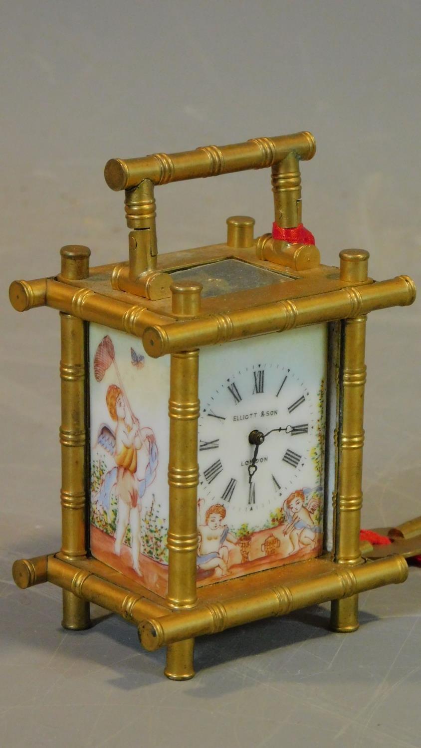 An antique gilt carriage clock, with enamel painted panels with cherubs catching butterflies. - Image 2 of 6