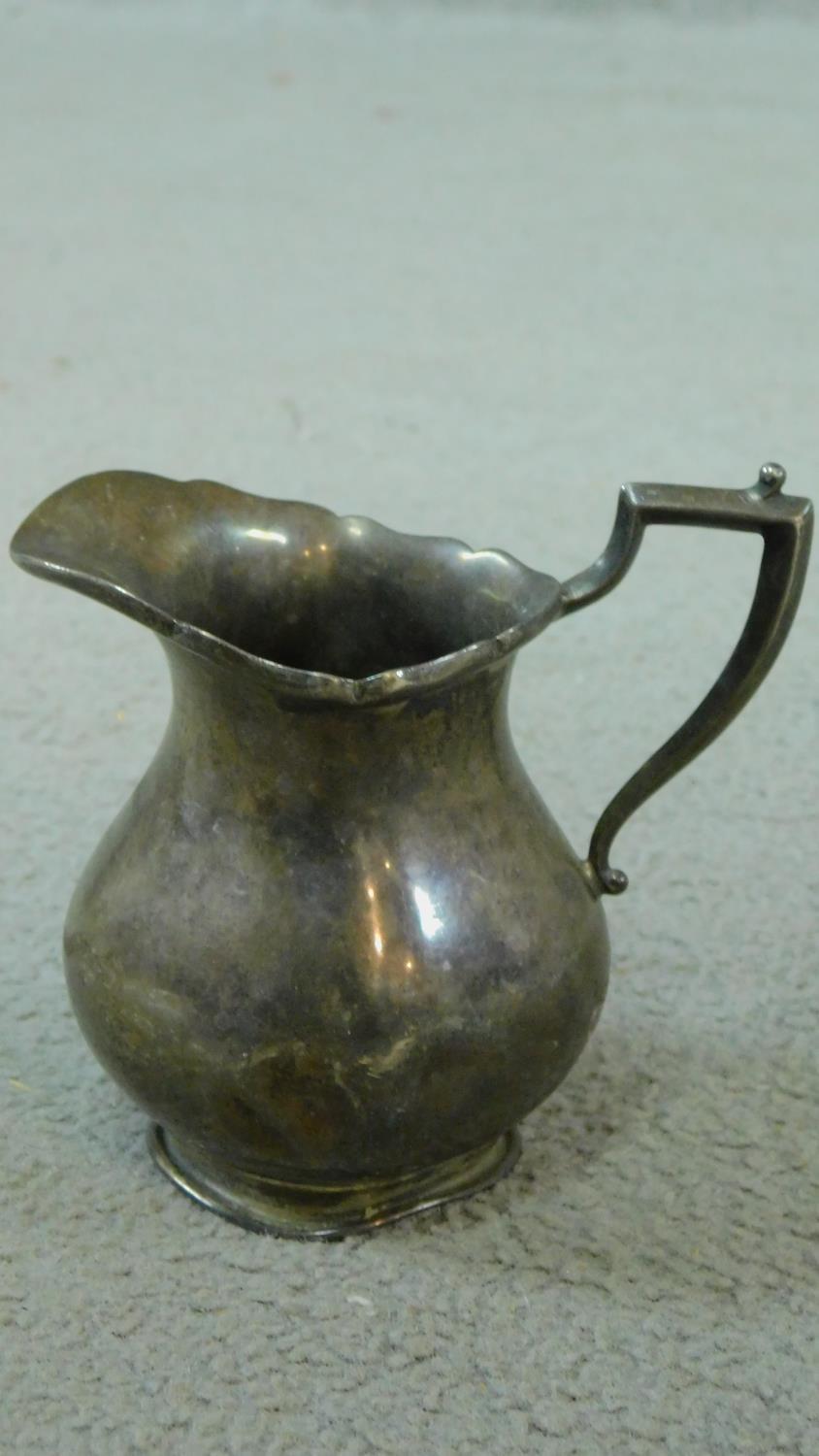 Two sterling silver items including an Edwardian milk jug with fluted rim and linear design - Image 5 of 7