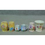 A collection of five vintage hand painted Radford Pottery vases and a jug. Two with yellow