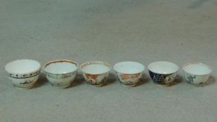 A collection of six antique hand painted porcelain tea bowls. Including four Chinese hand painted
