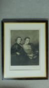 A framed and glazed signed lithograph of two noblemen. 56x72cm