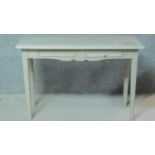 A painted pine console table fitted frieze drawers on square tapering supports. H.85 W.127 D.54cm