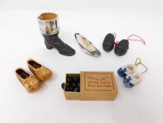 A silver collared Doulton Lambeth match holder, a box of antique papier mache boot buttons, a silver