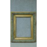 A 19th century giltwood and gesso floral moulded picture frame. 101x124cm