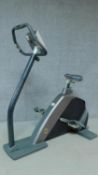 A modern Tunturi exercise bike, in working order. H.136 W.135 D.70cm