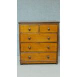 A 19th century mahogany chest of two short over three long drawers on plinth base. H.107 W.96 D.49cm