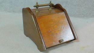 An Edwardian mahogany and inlaid coal box with brass carrying handle. H.31 W.36 D.46cm