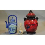 A collection of ceramics and glass. Including a West German glazed ceramic lidded Rumtopf jar with