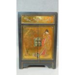 A small Japan lacquered bedside cabinet with character marks to the inside. H.60 W.40 D.32cm