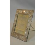 An Edwardian Art Nouveau design silver easel frame hallmarked: J&RG for J & R Griffin (Joseph &