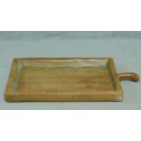 A northern Thai antique teak sticky rice tray with handle. 51x86cm
