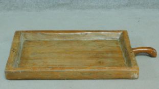 A northern Thai antique teak sticky rice tray with handle. 51x86cm