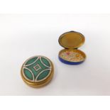 Two enamel boxes. One Continental silver royal blue guilloche enamel pill box with garland and