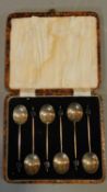 A cased set of English hallmarked silver spoons with coffee bean handles. H.15 W.13cm (box)