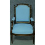 A 19th century French walnut armchair in sky blue fabric painted upholstery. H.97cm