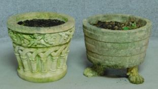 A reconstituted stone garden planter on Regency style lions paw feet and another similar. H.37cm (